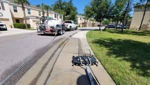 Our concrete cleaning service effectively removes dirt, stains, and grime from your driveways, sidewalks, and patios using top-of-the-line pressure washing equipment for a fresh and polished look. for Blue Stream Roof Cleaning & Pressure Washing  in Dover, FL