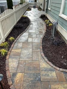 Our Mulch Installation service offers homeowners a convenient and efficient way to enhance the appearance, health, and sustainability of their gardens by applying fresh mulch to protect soil and plants. for Vivid Color Landscapes, LLC in Woodstock, GA