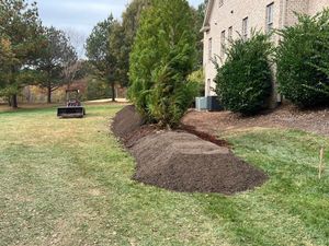 Enhance your landscape with our Ball & Burlap Tree Planting service, expertly installing healthy trees carefully wrapped for protection, ensuring strong growth and seamless integration into your home's outdoor environment. for Howerton’s Landscaping in Clemmons, NC