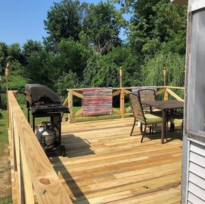 Transform your outdoor space with our expert deck and patio installation services, ensuring quality craftsmanship and durable materials tailored to enhance your home’s aesthetic and functionality for years to come. for Rowan Renovations in Warwick, RI