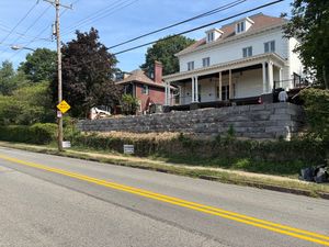 Our Retaining Wall Construction service is perfect for homeowners who want to add extra stability and support to their property. We use high-quality materials and construction techniques to create a sturdy wall that will last for years. for Bakey's Concrete and Excavating in Latrobe, PA
