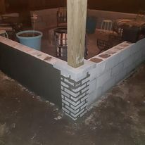 Our Retaining Wall Construction service can help homeowners create a beautiful and functional outdoor space. We can build custom retaining walls that will add value to your home and make your yard more enjoyable. for All in One Landscaping in Jacksonville, NC