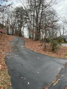 Our Fall and Spring Clean Up service helps maintain your lawn's beauty by removing leaves, trimming shrubs, edging beds, and more. for C and C Lawn Care Services in Fredericksburg, VA