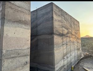 Our Rammed Earth Construction service creates durable, energy-efficient walls using natural materials, adding strength, and timeless design to your home. for Eco Form Construction in Tucson, AZ