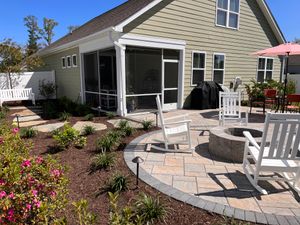 Enhance your outdoor living space with our exquisite Fire Pits service, providing warmth and ambiance for relaxed gatherings in your own backyard. for Djosey Landscapes in Wilmington, NC