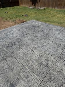 Transform your outdoor space with our expert decorative concrete installation, offering beautiful, durable surfaces that mimic natural stone at a fraction of the cost. Enhance your home’s curb appeal effortlessly. for Modern Concrete LLC in Lowell, AR