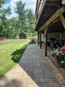 The Deck & Patio Cleaning service provides expert, thorough, and professional service to clean and restore decks and patios. We use the latest equipment and techniques to get the job done right, and our experienced team will leave your outdoor space looking like new. for Premier Power Washing LLC in Waupaca, WI