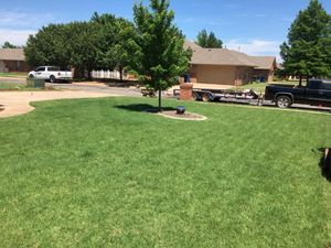 Our Flower Bed Installation service offers homeowners a professional and hassle-free solution for creating beautifully designed flower beds to enhance the aesthetic appeal of their lawn. for JJ Complete Lawn Service LLC  in Edmond, OK