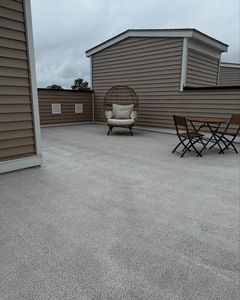 Our pressure washing service rejuvenates outdoor spaces, complementing any patio design & construction by removing dirt and grime, ensuring your home exterior remains stunning and well-maintained throughout the year. for Archer's Grounds Maintenance in Chesterfield, VA