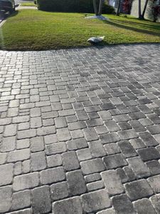 Our Sealing service ensures your outdoor space remains protected and looks its best, extending the life of surfaces such as driveways, patios, and decks against wear and tear. for Team Tolson Landscape in Tampa Bay, FL