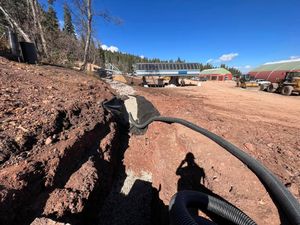 Our French drain service efficiently redirects water away from your property, preventing basement flooding and soil erosion. Trust our experts to safeguard your home's foundation with durable, professional installation solutions. for Real Time Excavation & Design in West Haven, UT