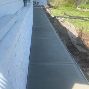 Enhance your home's curb appeal and functionality with our professional Sidewalk Installation service. Our experienced team will expertly install durable and visually appealing sidewalks to improve your property. for William L Cilk Concrete in Imlay City, MI