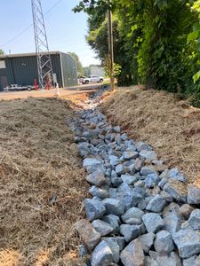 Our Drainage service helps homeowners effectively manage excess water and prevent flooding by providing expert solutions for proper drainage systems around their property. for Southern Land Solutions Forestry Mulching, LLC in Cleveland, NC