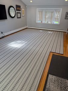 Our Area Rug Templating and Fabrication service customizes rugs to fit your space perfectly, ensuring precise measurements and design personalization for a unique addition to your home's decor. for DML Workroom in Whitman, MA