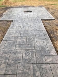 Transform your outdoor spaces with our Stamped Concrete Installation service. Offering durable, aesthetically pleasing surfaces, we mimic natural materials to enhance curb appeal with diverse patterns and colors tailored to your preferences. for Bell’s Concrete in Princeton, KY