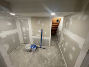 Our Drywall & Taping Services offer professional installation and finishing of drywalls, ensuring a smooth and seamless walls for your home, enhancing its overall appearance. for Elevation Painting & Carpentry in Westchester County, NY
