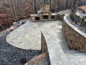 Our Outdoor Fireplaces service offers homeowners the opportunity to create a cozy and inviting outdoor space, perfect for gathering with friends and family all year round. for Fusion Contracting in North Georgia, GA