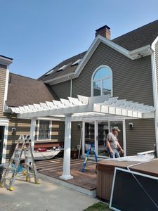 Our expert deck and patio builders near you provide top-notch installation services to transform your outdoor living space into a beautiful and functional area for relaxation and entertaining. for Tony Reardon & Sons in Seabrook,  NH