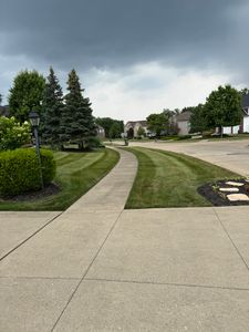 Our Mowing service ensures your lawn stays pristine and healthy, providing precise cuts with professional equipment and expert care to enhance curb appeal and promote robust grass growth throughout the seasons. for Vasel's Landscaping Services in Medina, OH