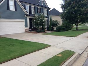 Our pressure washing service utilizes high-pressure water to effectively clean and restore surfaces like driveways, decks, and siding, enhancing the overall appearance and value of your home. for Sexton Lawn Care in Jefferson, GA