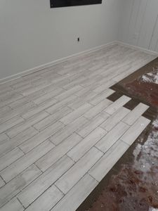 A tile is a flooring option that is durable, easy to clean, and can add value to your home. Our tile installation service can help you choose the right type of tile for your home and install it for you. for Fricks Home Services in Flowery Branch, GA