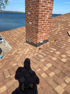 We are a roofing and construction company that specializes in chimney installation and repairs. We have the experience and expertise to get the job done right, ensuring that your chimney is safe and properly functioning. Contact us today for a free consultation! for 757 Roofing Specialist in Cranston, RI