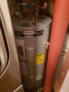 Our expert Water Heater Services ensure efficient installation and repair of all types and brands. Enjoy reliable hot water access with routine maintenance checks to enhance longevity and performance for your home. for Freedom Plumbing and Heating LLC in Windham, NH