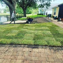 Our Landscape Design & Installation service can help you create the perfect outdoor space for your home. We can design and install a variety of features, including gardens, decks, and fences. We also offer snow removal services to keep your property safe and clean during the winter months. for Lawns By St. John in North East, Florida