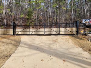 Our Gate installation and repair service ensures that your fencing system is complete with safe, functioning gates to enhance security and convenience for your property. for Moores Fencing in Columbus, GA