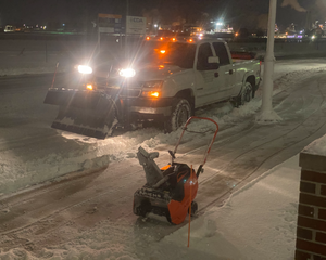 We provide professional snow plowing services to help keep your driveway and sidewalks clear during the winter months. for Lake Huron Lawns in Port Huron, MI