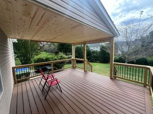 Transform your outdoor space with our expert deck and patio installation services. We offer customized designs, quality materials, and professional craftsmanship to enhance your home's beauty and functionality. for Redwood Construction in Asheville, NC