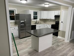 Our Kitchen and Cabinet Refinishing service offers homeowners a cost-effective solution to update and transform their kitchen cabinets, enhancing the overall aesthetic appeal of their home. for Soden Paint Collective, LLC in Booneville, MS