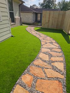 Enhance your home's outdoor beauty with our premium artificial turf service, offering realistic, low-maintenance lawns that stay lush year-round. Enjoy eco-friendly solutions that save water and reduce yard upkeep effortlessly. for Bruno's Professional Lawn's & Landscape in Beaumont, TX