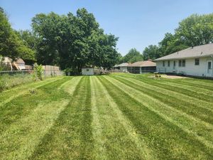 Our professional mowing service ensures your lawn remains neat and healthy, with precise cuts, regular maintenance schedules, and attention to detail that enhances curb appeal and promotes vigorous grass growth. for Curb Appeal Lawn Care in Kansas City, Kansas