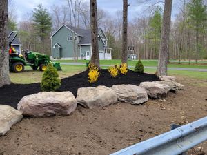 Enhance your landscape with our professional mulch installation service, providing a polished look while retaining soil moisture and suppressing weeds—perfect for maintaining a healthy and vibrant garden year-round. for Metro Landscaping in Derry Village, NH