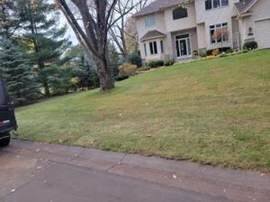 Our professional mowing service ensures your lawn is meticulously maintained, enhancing curb appeal and promoting healthy grass growth by using top-quality equipment for precise, consistent cuts every time. for Urban Green Lawncare & Snow Removal in Lakeville, MN