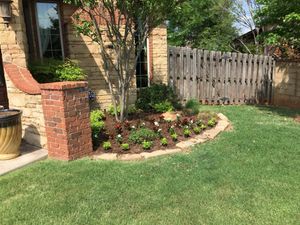 Our Mulch Installation service offers homeowners a hassle-free solution to enhance the visual appeal of their lawn and garden beds while improving soil health and weed prevention. for JJ Complete Lawn Service LLC  in Edmond, OK