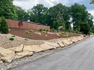 We specialize in crafting stunning outdoor landscapes tailored to your home or business. With our professional landscape design and installation services, we create custom outdoor spaces that enhance the beauty and functionality of your property. for Resnik Landscaping Services in New Kensington, PA