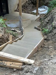 Enhance your home's elegance with our expert stair design and installation service. We craft durable, stylish concrete stairs tailored to your vision, ensuring a seamless blend of functionality and aesthetics. for Concrete Pros, LLC in Lorain, OH