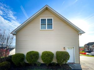 Soft house washing uses a gentle, low-pressure water technique combined with specialized solutions to remove dirt, grime, mold, algae, and organic stains from house exteriors, safeguarding your exterior from potential high-pressure damage. for Elite Wash LLC in Roanoke, Virginia