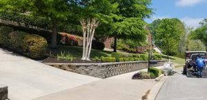 Our Retaining Wall Construction service ensures the stability and durability of your landscape, preventing soil erosion and providing a beautiful structure to enhance the overall appearance of your property. for Andres Landscaping, LLC in Decatur, AL