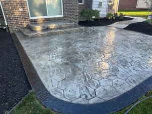 We offer stamped concrete installation to enhance your home's aesthetic appeal with customizable patterns and designs, providing a durable and cost-effective option for driveways, patios, and walkways. for Crown Cement in Lincoln Park, MI