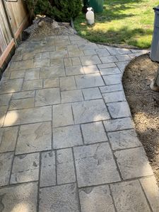 Our Stamped Concrete Installation service allows you to transform your plain concrete surfaces into beautiful, decorative ones with a stamped design of your choice. Enhance the look and value of your property! for Zions Concrete LLC in Federal Way, WA
