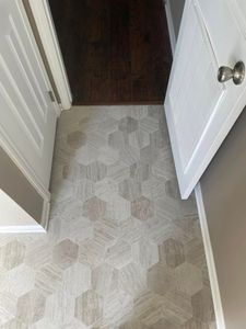 Transform your home's look with our expert vinyl flooring services. Durable and stylish, our sheet vinyl offers an affordable solution for any room, providing comfort and elegance that's easy to maintain. for Brooks Flooring in Burlington, NC