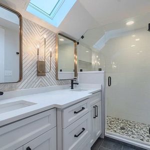 Transform your bathroom into a modern sanctuary with our expert renovation services, featuring quality craftsmanship and personalized designs to enhance functionality and style according to your specific needs and preferences. for Lamy Construction Inc in Dracut, MA