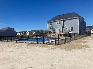 Our Metal Fencing service provides durable and secure fencing solutions for your property, offering both functionality and aesthetic appeal to enhance the safety and beauty of your home. for Sea Level Fence in Virginia Beach, VA