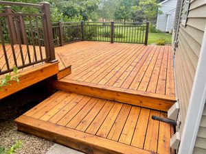 Our Deck Staining service provides homeowners with professional and reliable solutions to enhance the appearance and protect their decks from harsh weather conditions for a long-lasting finish. for TC Paints in Minneapolis, Minnesota