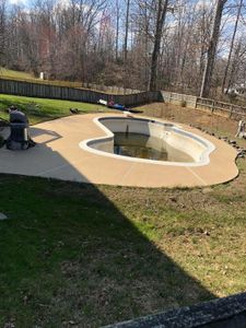 Concrete Cleaning is a service that we offer to clean and seal your concrete driveway, patio, or any other concrete surface. We use a special cleaner and sealer to clean and protect your concrete from staining and weathering. for Hammerhead Pressure Washing in Mineral, VA