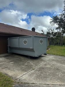 Our 12 Yard Dumpster rental service is perfect for small clean-ups and home improvement projects. We deliver the dumpster to your driveway, you fill it up, and we haul it away when you're done! for Brevard Dumpsters in Palm Bay, FL