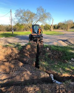 Our trenching service offers precise and efficient digging for utility installations, drainage systems, and landscaping needs. Trust our experienced team to enhance your property's functionality while ensuring safety and minimal disruption. for Escobar Excavating in Houston, TX